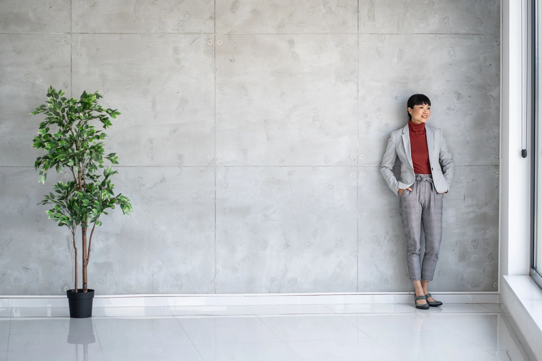 Professional woman in a modern office with artistic sensibility